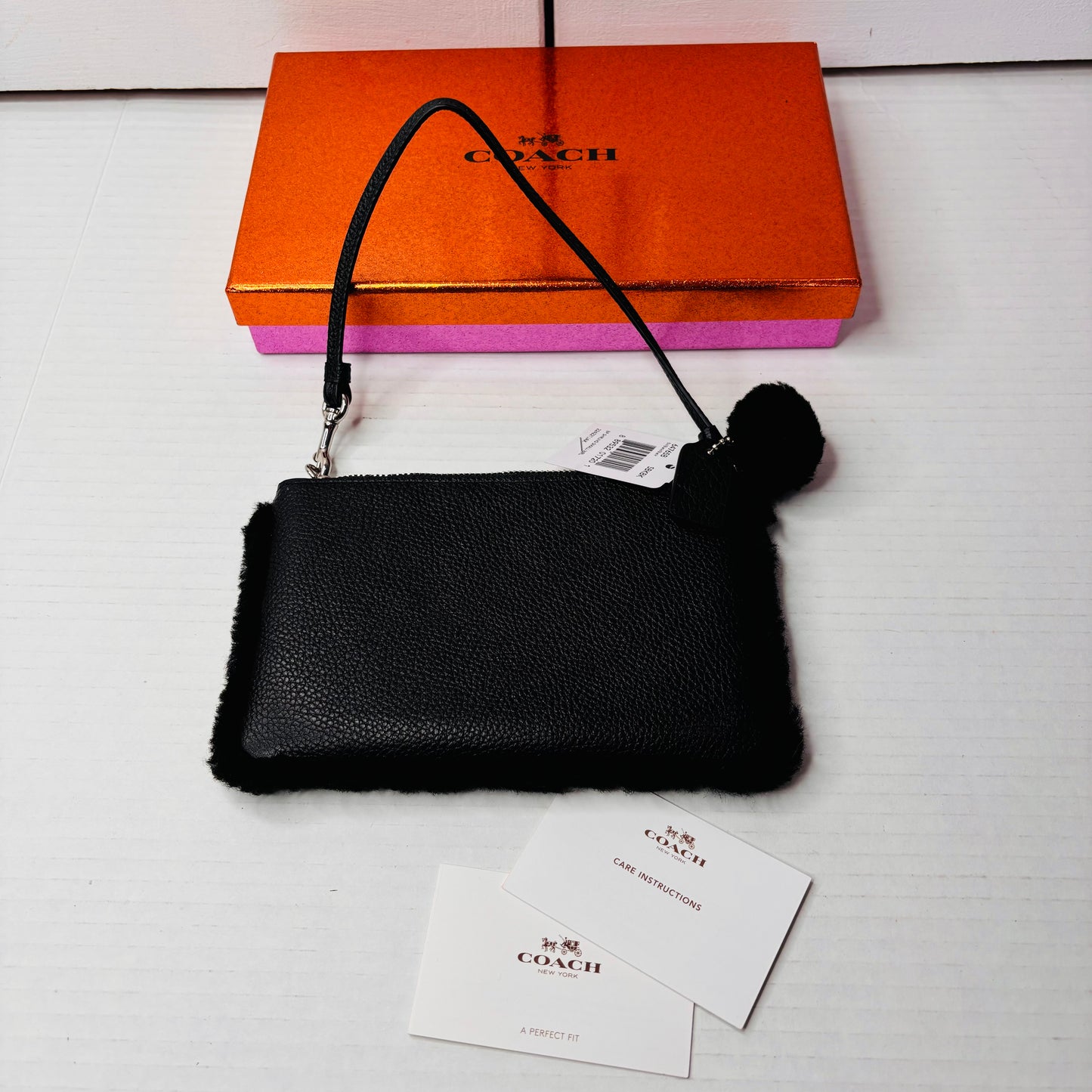 *NEW* COACH Black Shearling Trim Pebbled Leather Wristlet