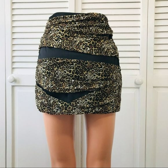 BEBE Animal Print Mesh Mini Skirt Size S (new with tags)