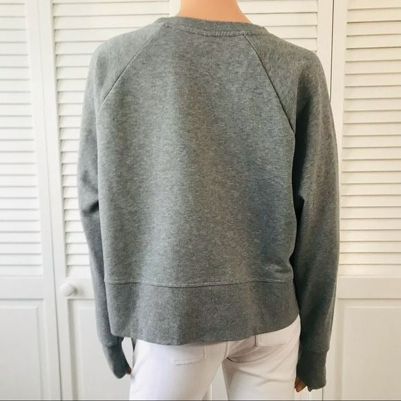 NIKE Versa Embossed Cropped Training Sweatshirt Size M