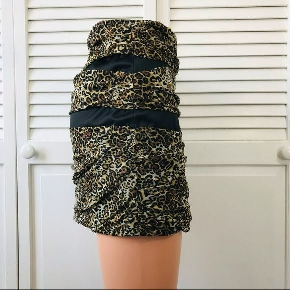 BEBE Animal Print Mesh Mini Skirt Size S (new with tags)